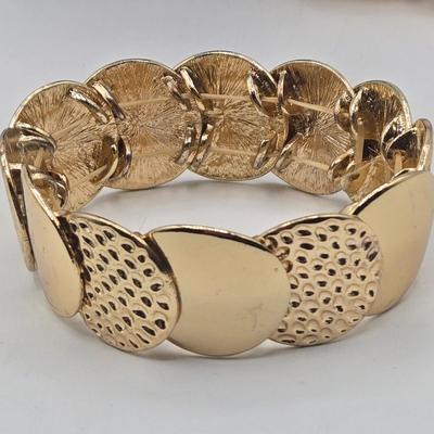 LOT 174J: Variety of Gold-tone Stretch and Clasp Bracelets