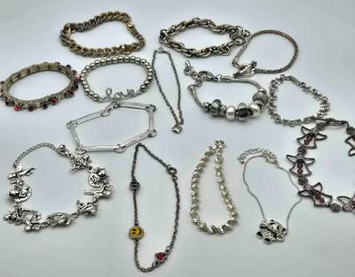LOT 178J: Multiple Silver-tone Bracelets and Ankle Bracelets