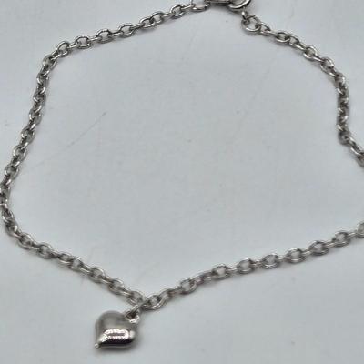 LOT 178J: Multiple Silver-tone Bracelets and Ankle Bracelets