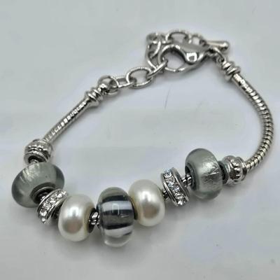 LOT 178J: Multiple Silver-tone Bracelets and Ankle Bracelets