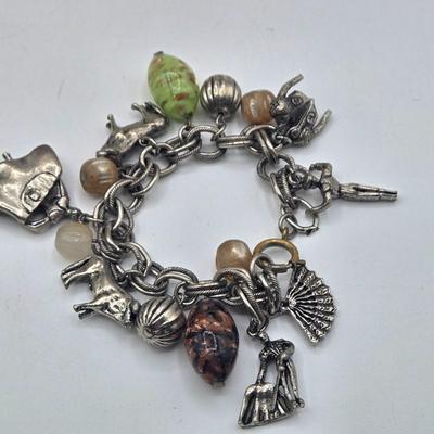 LOT 192J: Filigree 2 Tone Necklace with Matching Earrings, Multiple Pairs of Pierced Earrings, Charm Bracelets, and More