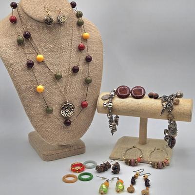 LOT 192J: Filigree 2 Tone Necklace with Matching Earrings, Multiple Pairs of Pierced Earrings, Charm Bracelets, and More