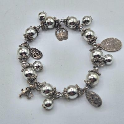 LOT 192J: Filigree 2 Tone Necklace with Matching Earrings, Multiple Pairs of Pierced Earrings, Charm Bracelets, and More