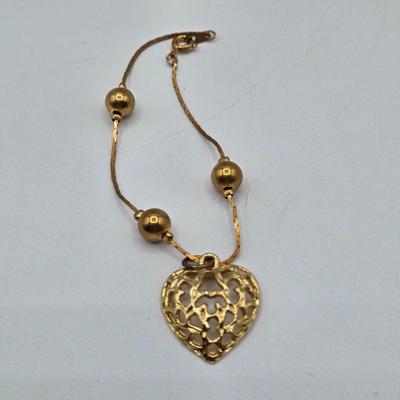 LOT 196J: Multiple Gold-tone Bracelets and Ankle Bracelets