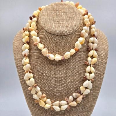 LOT 197J: Shell Necklace and More