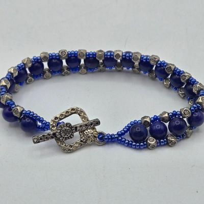 LOT 199J: Variety of Colorful Stretch and Cuff Bracelets