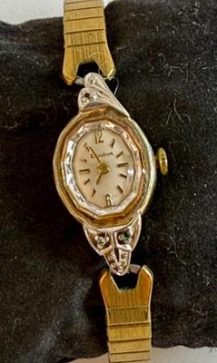 Sale Photo Thumbnail #68: 10K Rolled Gold Plate case and a stretch band. Manual-wind watch, hands can be adjusted and appears to be running.