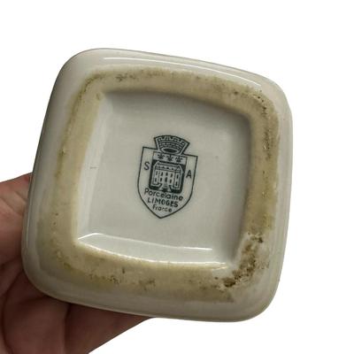 Sale Photo Thumbnail #292: Lot of 3 Vintage Ceramic Pieces- lady is a bell, container with lid, and ashtray