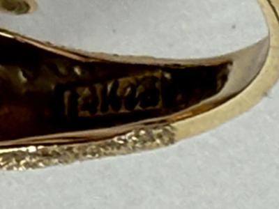 Sale Photo Thumbnail #44: Whimsical dolphin shape with a textured finish.  Weight is 6.3g.