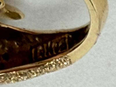 Sale Photo Thumbnail #43: Whimsical dolphin shape with a textured finish.  Weight is 6.3g.