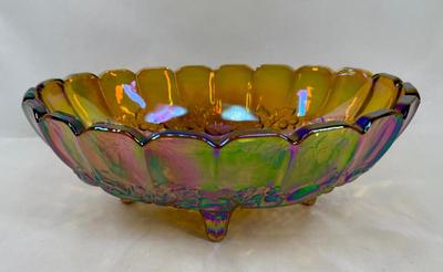 Sale Photo Thumbnail #593: Nice, heavy footed bowl. Iridescent amber color.  Scalloped top edge. Approx. 12" long at the widest part.