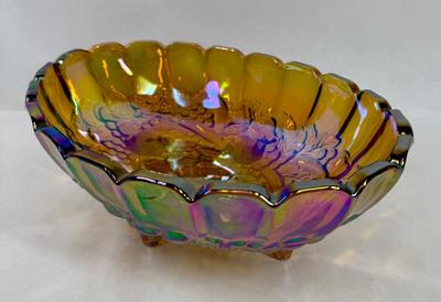 Sale Photo Thumbnail #596: Nice, heavy footed bowl. Iridescent amber color.  Scalloped top edge. Approx. 12" long at the widest part.