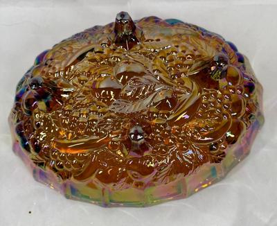 Sale Photo Thumbnail #600: Nice, heavy footed bowl. Iridescent amber color.  Scalloped top edge. Approx. 12" long at the widest part.