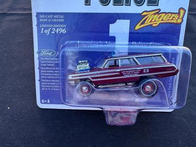 JOHNNY LIGHTNING LIMITED EDITION 1964 FORD POLICE COUNTRY SQUIRE