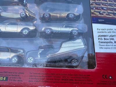 JOHNNY LIGHTNING COMMEMORATIVE LIMITED EDITION 8-CAR SET WITH REAL METAL CHROME PLATING