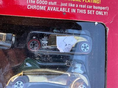 JOHNNY LIGHTNING COMMEMORATIVE LIMITED EDITION 8-CAR SET WITH REAL METAL CHROME PLATING