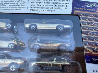 JOHNNY LIGHTNING COMMEMORATIVE LIMITED EDITION 8-CAR SET WITH REAL METAL CHROME PLATING