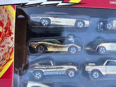 JOHNNY LIGHTNING COMMEMORATIVE LIMITED EDITION 8-CAR SET WITH REAL METAL CHROME PLATING