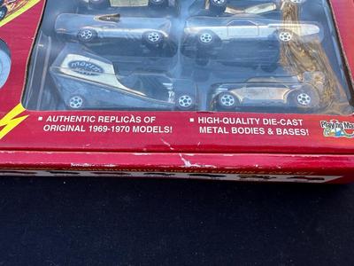 JOHNNY LIGHTNING COMMEMORATIVE LIMITED EDITION 8-CAR SET WITH REAL METAL CHROME PLATING