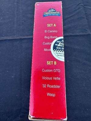 JOHNNY LIGHTNING COMMEMORATIVE LIMITED EDITION 4-CAR SET WITH REAL METAL CHROME PLATING