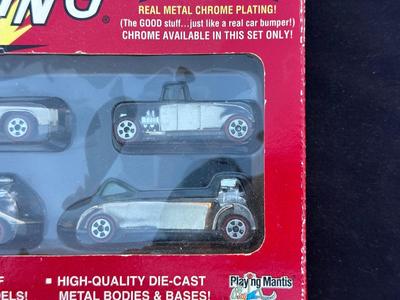 JOHNNY LIGHTNING COMMEMORATIVE LIMITED EDITION 4-CAR SET WITH REAL METAL CHROME PLATING
