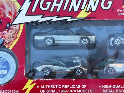 JOHNNY LIGHTNING COMMEMORATIVE LIMITED EDITION 4-CAR SET WITH REAL METAL CHROME PLATING