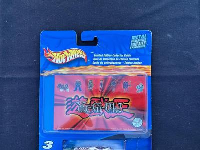 HOT WHEELS “YU-GI-OH” 3-CAR SET WITH LIMITED EDITION COLLECTOR GUIDE
