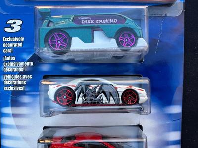 HOT WHEELS “YU-GI-OH” 3-CAR SET WITH LIMITED EDITION COLLECTOR GUIDE