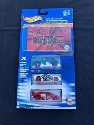 HOT WHEELS “YU-GI-OH” 3-CAR SET WITH LIMITED EDITION COLLECTOR GUIDE