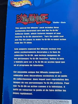 HOT WHEELS “YU-GI-OH” 3-CAR SET WITH LIMITED EDITION COLLECTOR GUIDE