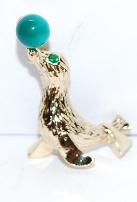 Green-Eyed Gold Colored SEAL BROOCH (1½" x 1") Balancing a Green Ball