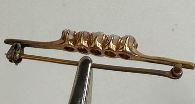 Sale Photo Thumbnail #142: No markings, non-magnetic and tested as 10k gold with a test kit. 2.9g total weight.