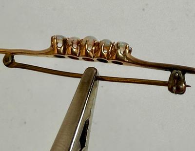 Sale Photo Thumbnail #141: No markings, non-magnetic and tested as 10k gold with a test kit. 2.9g total weight.