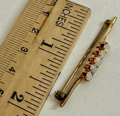 Sale Photo Thumbnail #143: No markings, non-magnetic and tested as 10k gold with a test kit. 2.9g total weight.