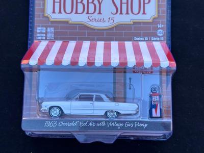 GREENLIGHT COLLECTIBLES “THE HOBBY SHOP” SERIES 15 LIMITED EDITION 1963 CHEVROLET BEL AIR WITH VINTAGE GAS PUMP