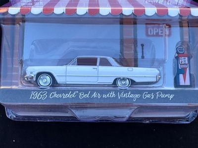 GREENLIGHT COLLECTIBLES “THE HOBBY SHOP” SERIES 15 LIMITED EDITION 1963 CHEVROLET BEL AIR WITH VINTAGE GAS PUMP