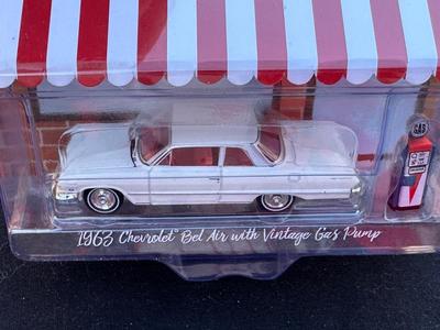 GREENLIGHT COLLECTIBLES “THE HOBBY SHOP” SERIES 15 LIMITED EDITION 1963 CHEVROLET BEL AIR WITH VINTAGE GAS PUMP