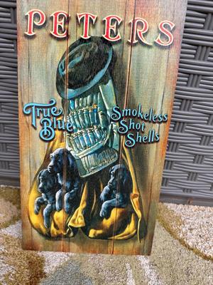 REMINGTON “PETERS TRUE BLUE PUPPIES” WOOD SIGN