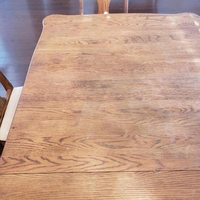 LOT 110: Dining Table with Six Matching Chairs