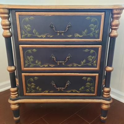 LOT 112: Black & Gold Chest of Drawers with Hand Painted Floral Design