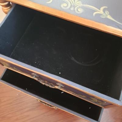 LOT 112: Black & Gold Chest of Drawers with Hand Painted Floral Design