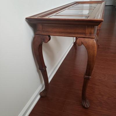LOT 117: Glass Top Wooden Console Table