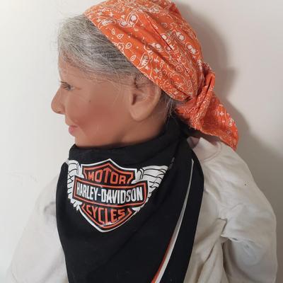 LOT 120: Pair of Custom-Made Harley Davidson Dolls