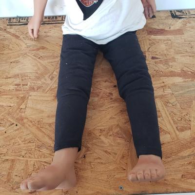 LOT 120: Pair of Custom-Made Harley Davidson Dolls