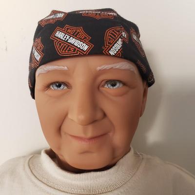 LOT 120: Pair of Custom-Made Harley Davidson Dolls