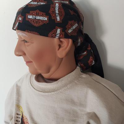 LOT 120: Pair of Custom-Made Harley Davidson Dolls