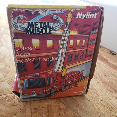 LOT 123: Vintage Tonka Fire Truck in Nylint Box (Not original to Truck)