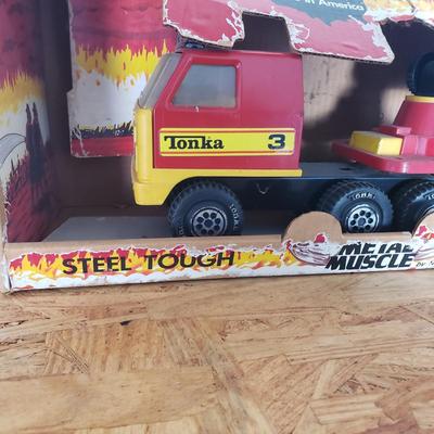 LOT 123: Vintage Tonka Fire Truck in Nylint Box (Not original to Truck)