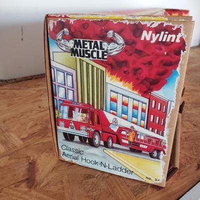 LOT 123: Vintage Tonka Fire Truck in Nylint Box (Not original to Truck)