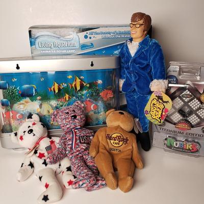LOT 194: Living Aquarium in Box, Vintage Austin Powers Doll, Rubiks Cube & Beanie Babies